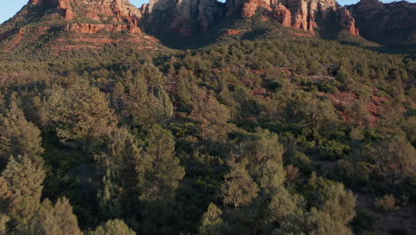 AERIAL:-Shot-in-Sedona-Arizona-of-rock-formations-and-landscape-on-a-sunny-day