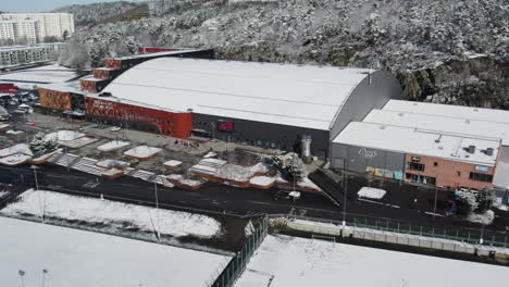 Drone-view-of-Prioritet-Serneke-Arena-at-Winter,-Establishing-shot