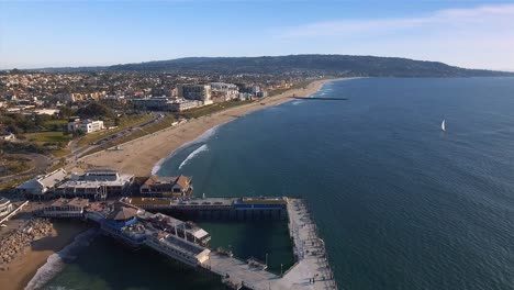 Aerial-footage,-camera-tilting-and-revealing-Redondo-Beach-Pier