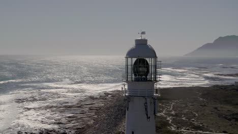 Slangkop-Lighthouse-UHD-Luftaufnahme-In-Kommetjie,-Kapstadt