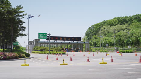 Road-entrance-next-to-Dorasan-Station-to-Kaesong-Industrial-Complex-in-North-Korea,-wide-shot-in-4K