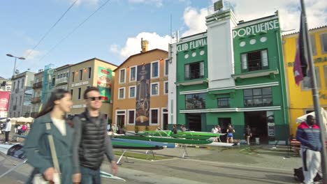 Bright,-lively-street-scene-in-Porto,-Portugal-with-colorful-buildings-and-a-nautical-club