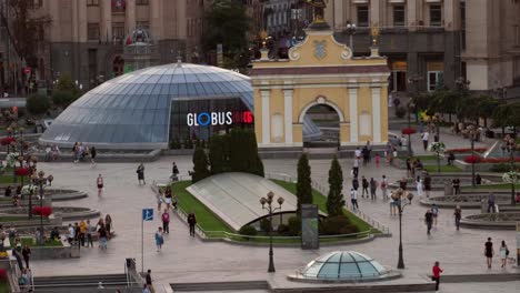 Telephoto,-elevated-shot-of-people-enjoying-a-fall-evening-in-Independence-Square,-Kyiv