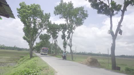 A-road-passing-amidst-a-village-of-Bangladesh-situated-in-a-remote-village-of-Gaibandha