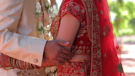 Indian-Wedding-Couple-Standing-And-Holding-Each-Other---Close-Up
