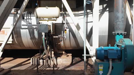 Panning-Shot-of-the-Large-Machinery-at-a-Wood-Pellet-Plant