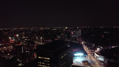 Drone-footage-of-the-Barclays-Center-area-of-Brooklyn,-New-York-at-night-time