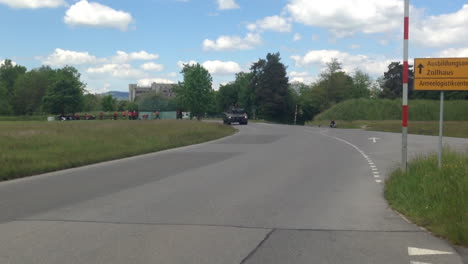 Grenadier-tanks-driving-by-on-military-base-in-Thun,-Switzerland