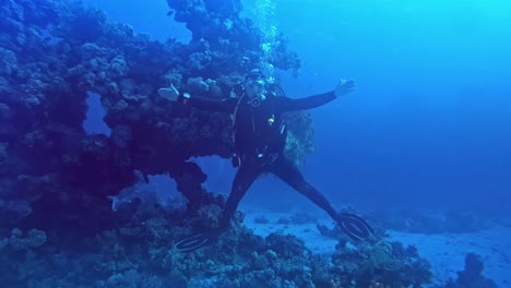 Diver-taking-break-in-X-pose