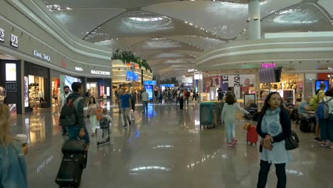 Aug-2019,-Istambul,-Turkey:-tourists-walking-inside-the-departure-hall-of-Istambul-airport