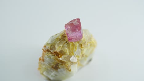 Pink-and-yellow-crystal-rotating