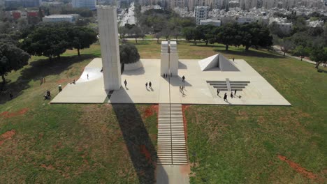 Aerial-view-over-people-at-the-Edith-Wolfson-Park,-in-Tel-Aviv,-Israel---tilt,-drone-shot