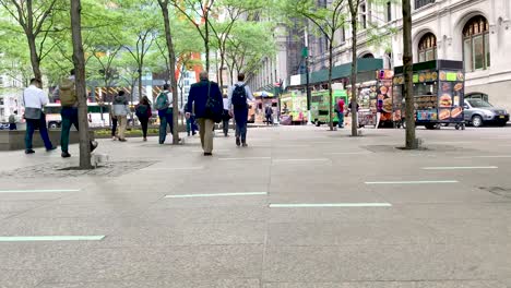 Morning-commuters-walking-through-plaza-in-New-York-City
