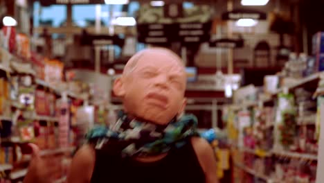 Lady-with-a-mask-dancing-in-grocery-store-aisle-Funny-Mask-Dance-Off-Happy-woman-Fun