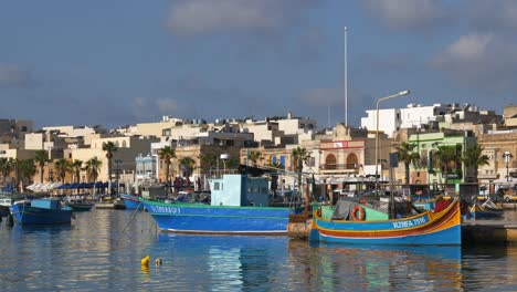 Marsaxlokk,-Malta---October-14,-2019:-Port-in-traditional-fishing-village-of-Marsaxlokk,-Malta-island-in-the-Mediterranean-Sea