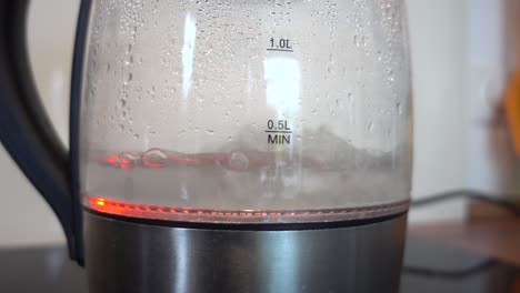 boiling-water-bubbles-in-a-glass-kettle