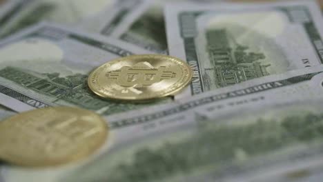 bitcoin-golden-coin-crypto-falling-over-100-usd-dollars-note-bill