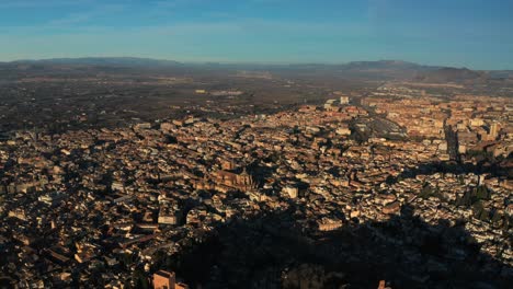 Aerial-Drone-View-Of-Historic-Town-With-Alhambra-Palace-In-Granada,-Andalusia,-Spain