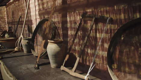 Slow-motion-shot-of-medieval-artifacts-and-products-at-a-village-fair-in-southern-Spain-during-the-morning-sun