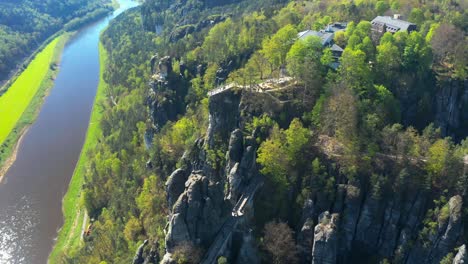 Bastei-Bridge-and-mountain-in-Elbe-valley-drone,-In-Saxon-Switzerland-National-Park-at-Kurort-Rathen-Near-Saxon-Capital-Dresden,-Germany