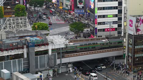 Beautiful-panoramic-view-of-train-running-on-tracks-in-Tokyo-City