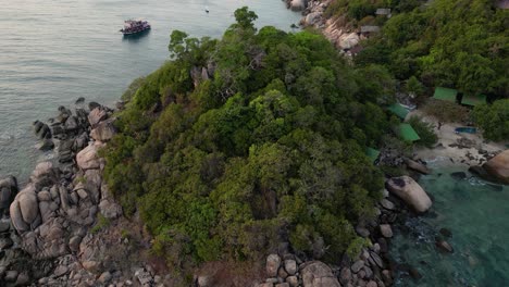 Slow-cinematic-tilt-up-reveal-over-beautiful-Thai-island-next-to-ocean