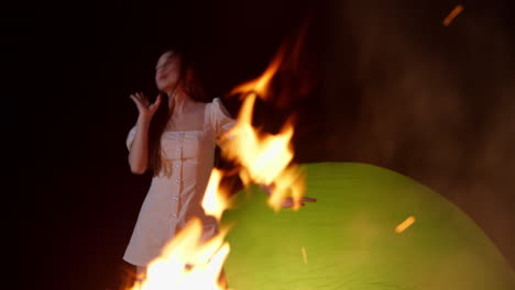 skilled-talented-woman-dancing-alone-at-night-in-front-of-fire-bonfire