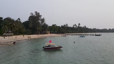 Aerial-View-Of-Boat-Moored-Off-Ao-Suan-Yai-Beach-At-Koh-Mak-Island