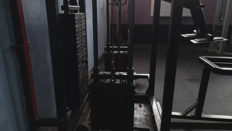 Old-pulley-machine-in-an-empty-gym