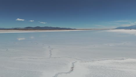 Landscape-of-the-water-mirror-over-the-natural-salt-flat-in-the-province-of-Jujuy,-Argentina