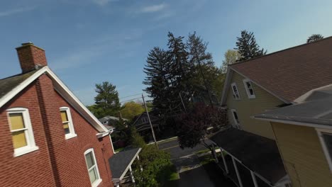 One-Family-Houses-in-small-american-town-with-garden-during-sunny-day