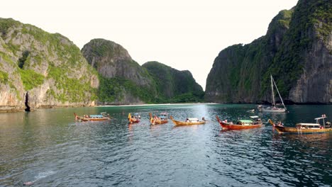 Boat-Leaving-Tropical-Island,-Humid-Foggy-Misty-Morning