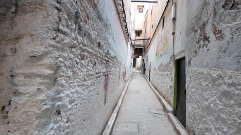 Fes-medina-old-city-walls-narrow-street-tourist-point-of-view-Morocco