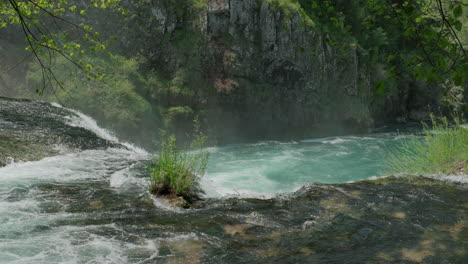 A-waterfall-of-a-pure-wild-river-located-in-a-green-rainforest