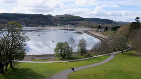Aerial-view-from-atop-Dunstaffnage-Castle-overlooking-park-grounds-and-ocean-water-in-Oban,-Argyll-and-Bute,-Western-Scotland-UK
