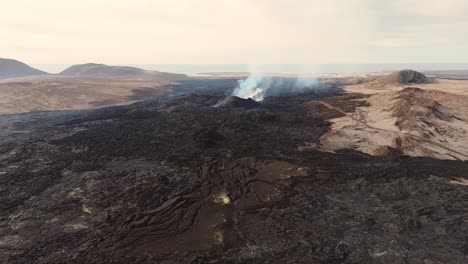 Smoking-active-Grindavík-volcano-in-desolate-volcanic-landscape