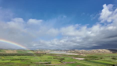 Rural-part-of-North-Morocco-countryside-rainbow-after-rain-green-agriculture-field