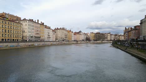 Colorful-apartment-blocks-by-the-river-side-in-Lyon-city-center