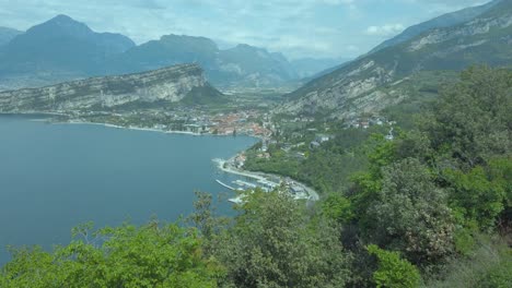 Panoramic-view-of-Lake-Garda-from-the-Busatte-Trail-during-a-storm,-ideal-for-nature-exploration-and-adventure-enthusiasts