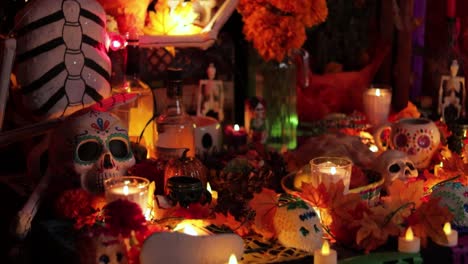 Day-of-the-Dead-ofrenda-on-the-altar,-burning-candles