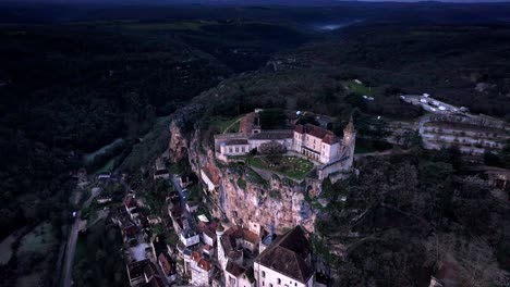 Orbital-shot-focused-on-Rocamadour-Chateau-before-dawn