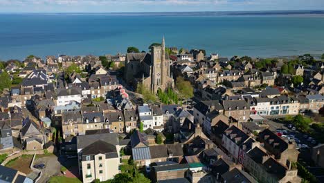 Saint-Meen-church-with-sea-in-background,-Cancale,-Brittany-in-France