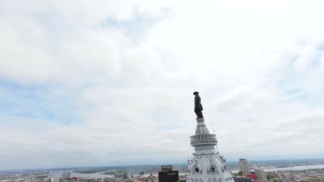 FPV-drone-shot-around-William-Penn-statue-on-City-Hall-in-downtown-Philadelphia,-Pennsylvania