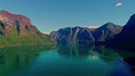 Drone-shot-over-Flam,-Norway-on-a-sunny-day