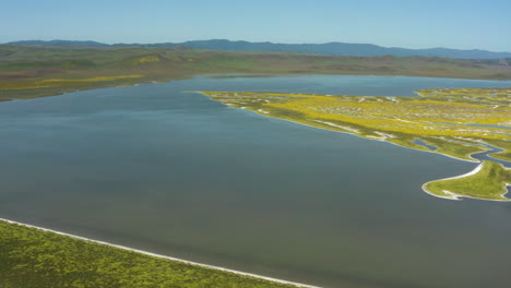 Beautiful-view-from-top-of-Soda-Lake-at-Carrizo-plains-in-California-shows-grassland,-clear-water-and-clean-sky