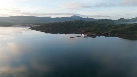 Islet-Landscape-Clouds-Reflected-on-Fornells-Bay-Menorca-Sea-Water-Aerial-Drone-Panoramic,-environment-of-Spanish-secret-travel-spot