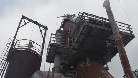 Low-angle-shot-of-the-preserved-structures-at-Völklinger-Hütte-Ironworks-in-Germany,-a-UNESCO-World-Heritage-Site