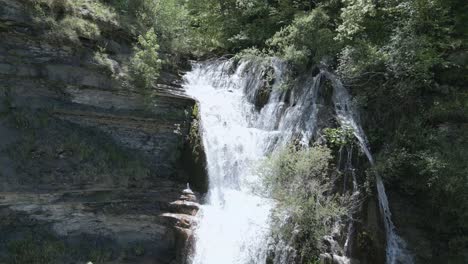 Soar-above-an-enchanting-waterfall-in-Italy-with-this-breathtaking-drone-footage