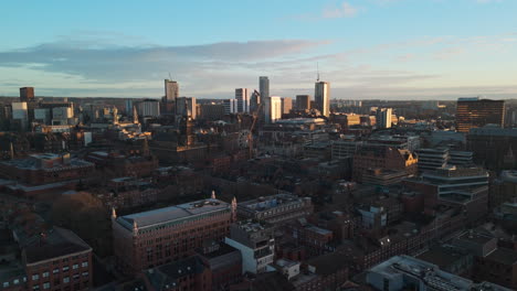 Rising-Establishing-Drone-Shot-of-Leeds-City-Centre-at-Golden-Hour-UK
