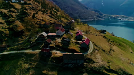 Drone-shot-of-houses-in-Norway's-remote-town-of-Flam
